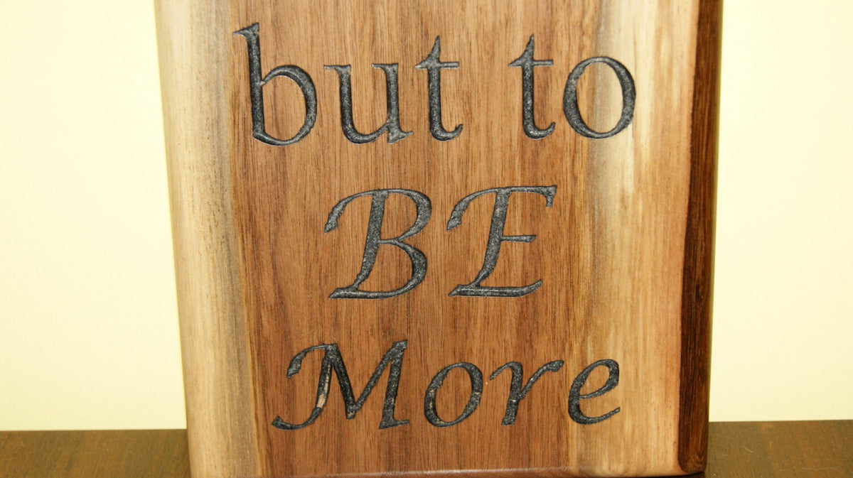 Aspire Not to Have More But to Be More Walnut Plaque